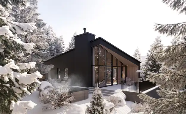 Vue extérieure d’une maison à vendre dans les Laurentides pendant l’hiver